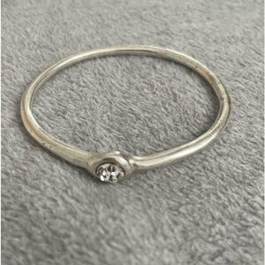 Great silver tone bangle with clear stone’